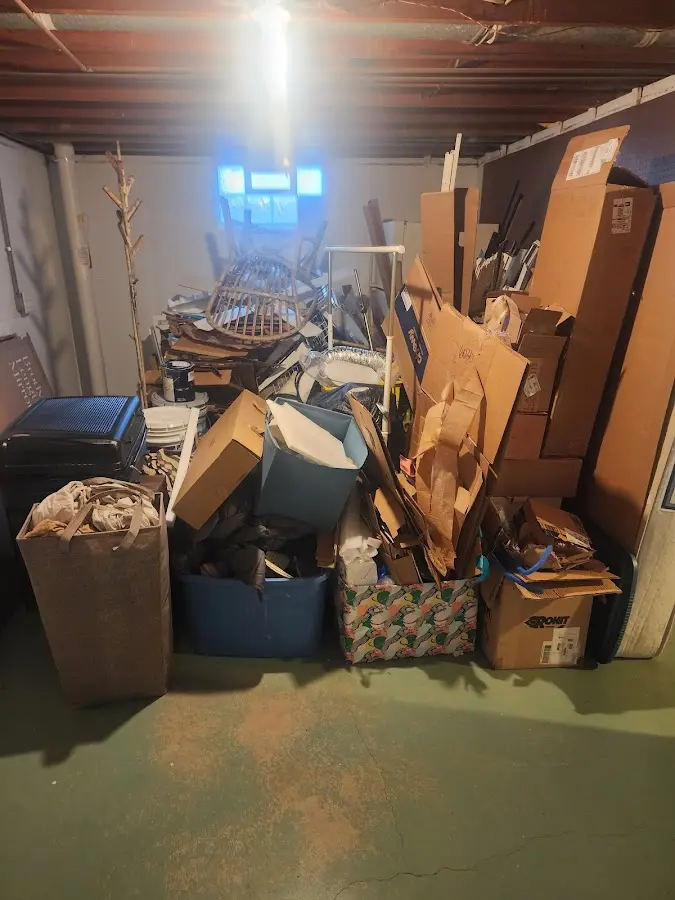 Roll-off dumpster container at job site for 2 Yard Dumpster Rental in Sitka